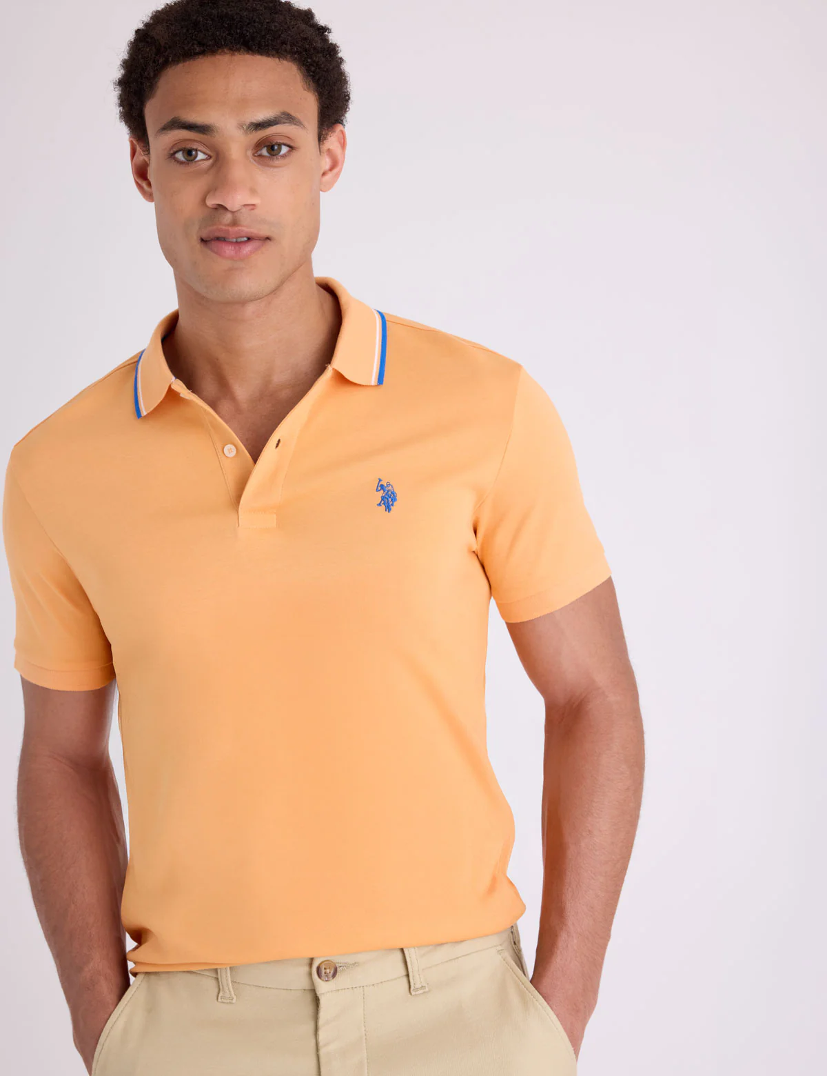 1038-slim-fit-tipped-interlock-polo-shirt-1.webp SLIM FIT TIPPED INTERLOCK POLO SHIRT