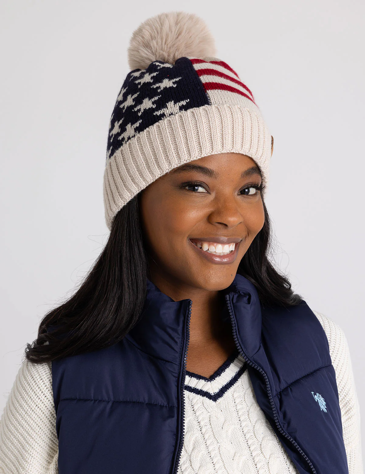 10403-ladies-fleece-lined-americana-beanie-with-pom-pom-1.webp LADIES FLEECE LINED AMERICANA BEANIE WITH POM POM
