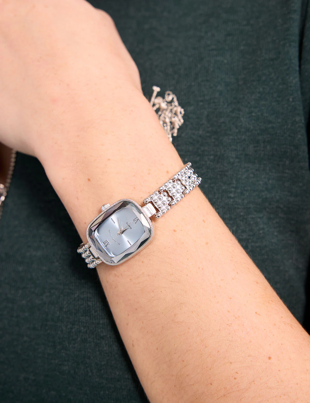 13161-ladies-silver-oval-watch-with-blue-face-1.webp LADIES SILVER OVAL WATCH WITH BLUE FACE