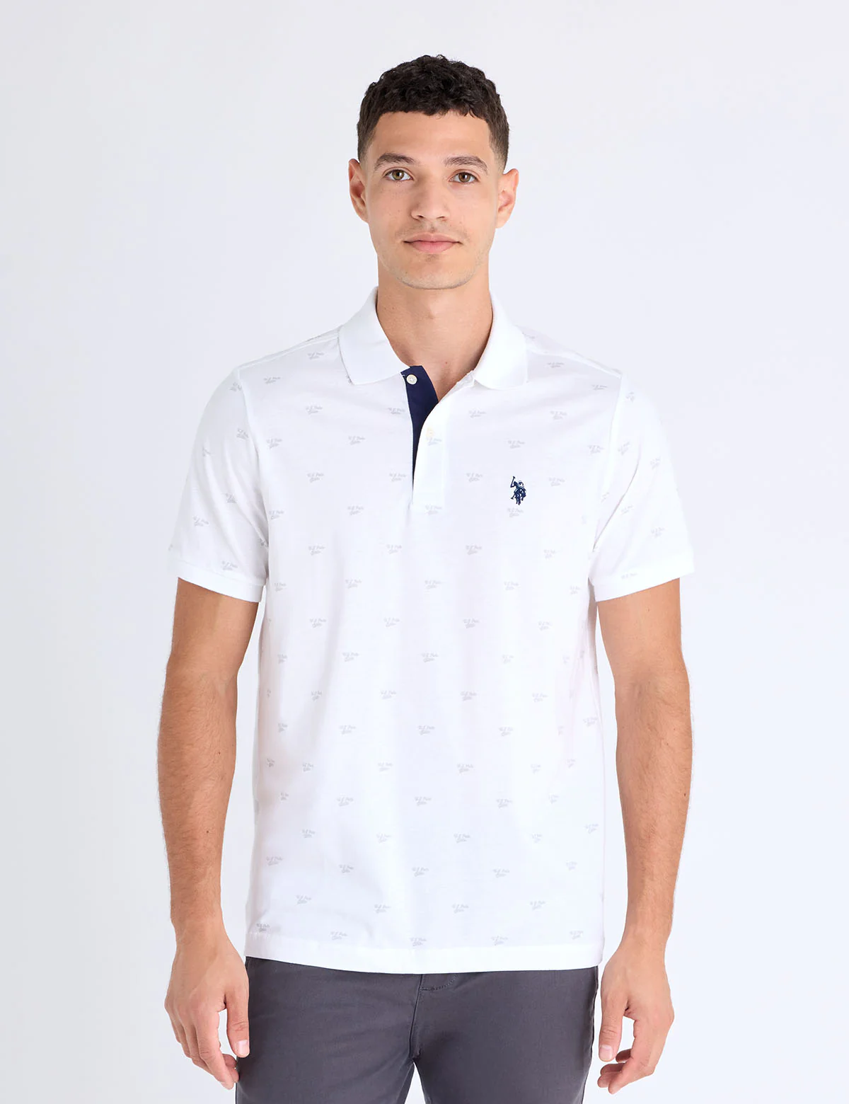 13216-all-over-wordmark-graphic-print-jersey-polo-shirt-1.webp ALL OVER WORDMARK GRAPHIC PRINT JERSEY POLO SHIRT