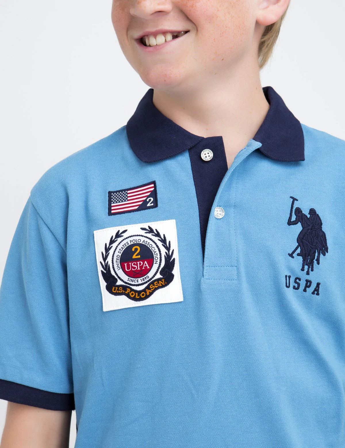 16433-boys-patch-polo-shirt-2.webp BOYS PATCH POLO SHIRT