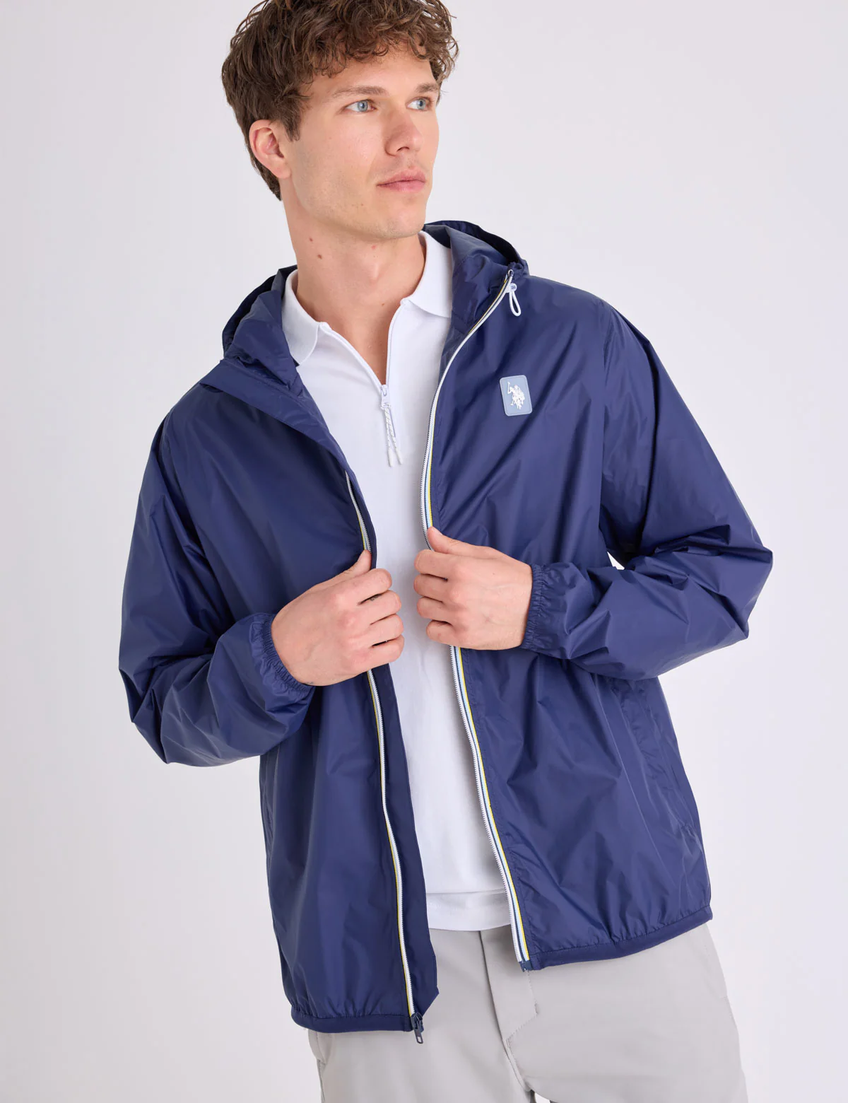 1812-signature-stripe-windbreaker-with-hood-1.webp SIGNATURE STRIPE WINDBREAKER WITH HOOD
