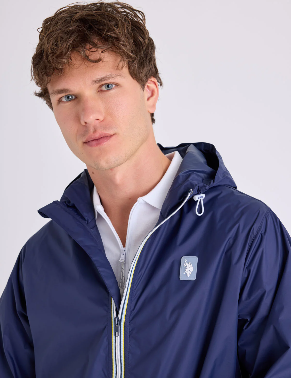1812-signature-stripe-windbreaker-with-hood-3.webp SIGNATURE STRIPE WINDBREAKER WITH HOOD