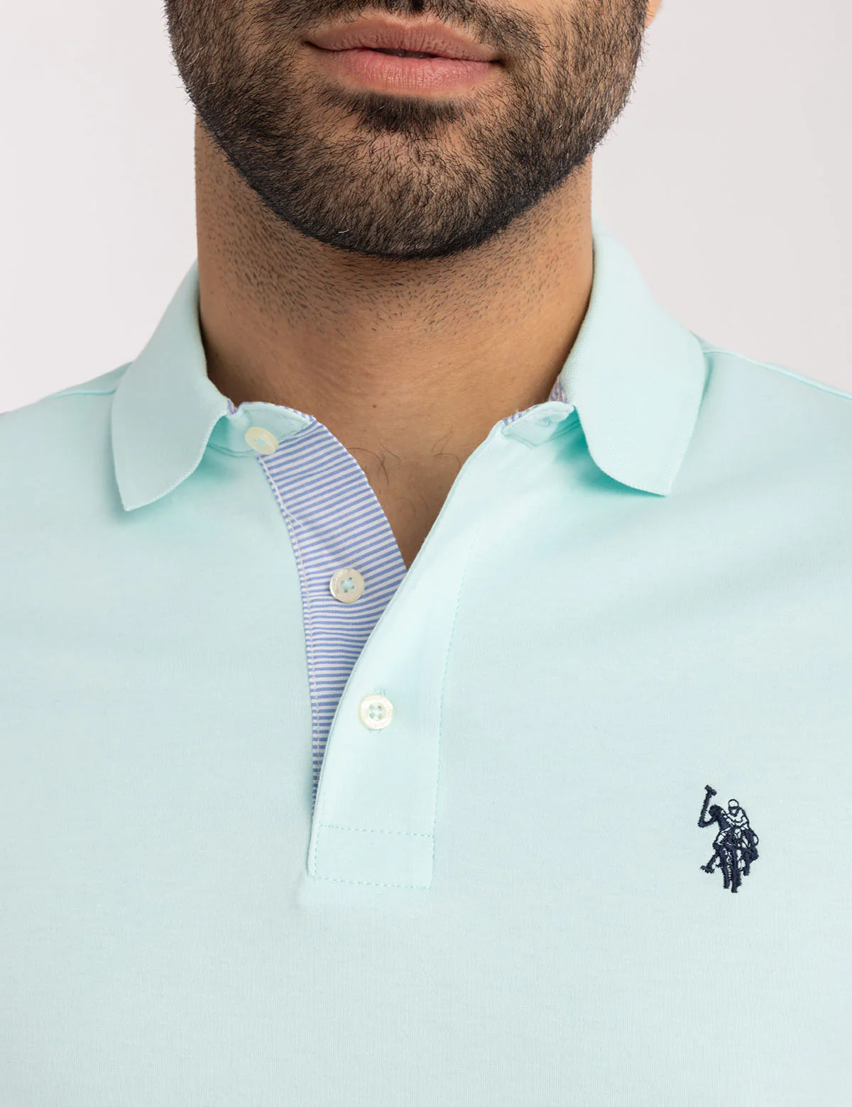 21116-solid-interlock-polo-shirt-with-woven-trim-10.webp SOLID INTERLOCK POLO SHIRT WITH WOVEN TRIM