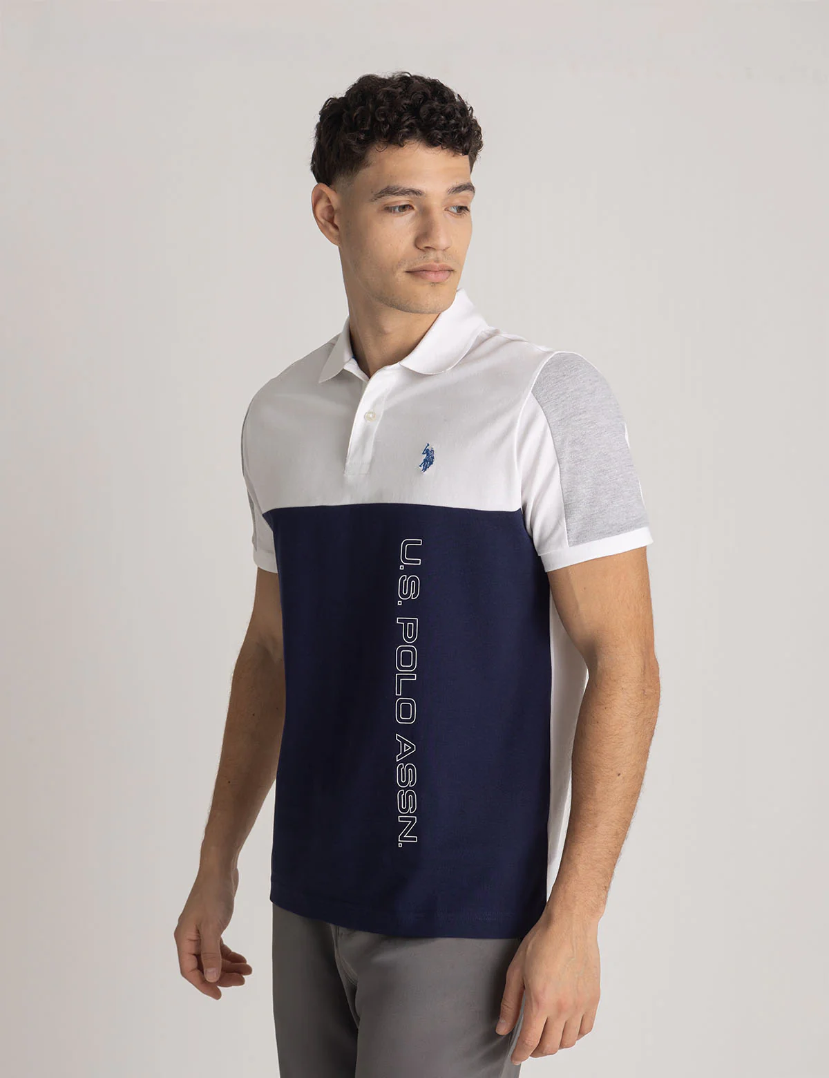 22674-color-block-wordmark-polo-shirt-1.webp COLOR BLOCK WORDMARK POLO SHIRT