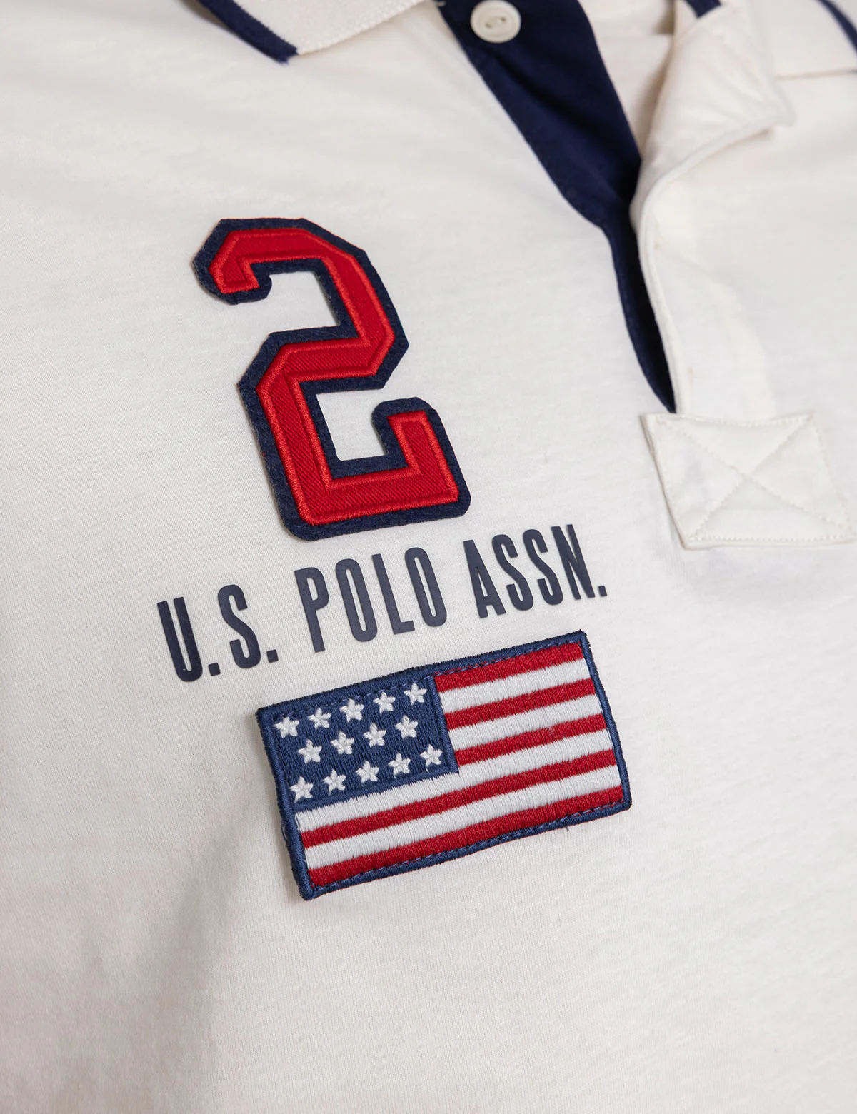 22720-peached-jersey-polo-shirt-with-applique-8.webp PEACHED JERSEY POLO SHIRT WITH APPLIQUE
