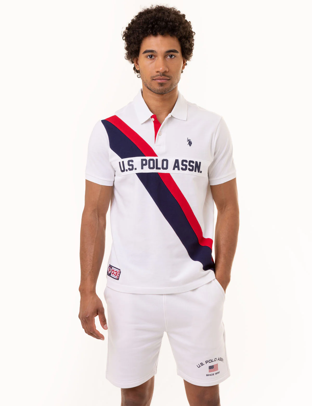 22911-pieced-diagonal-sash-pique-polo-shirt-1.webp PIECED DIAGONAL SASH PIQUE POLO SHIRT