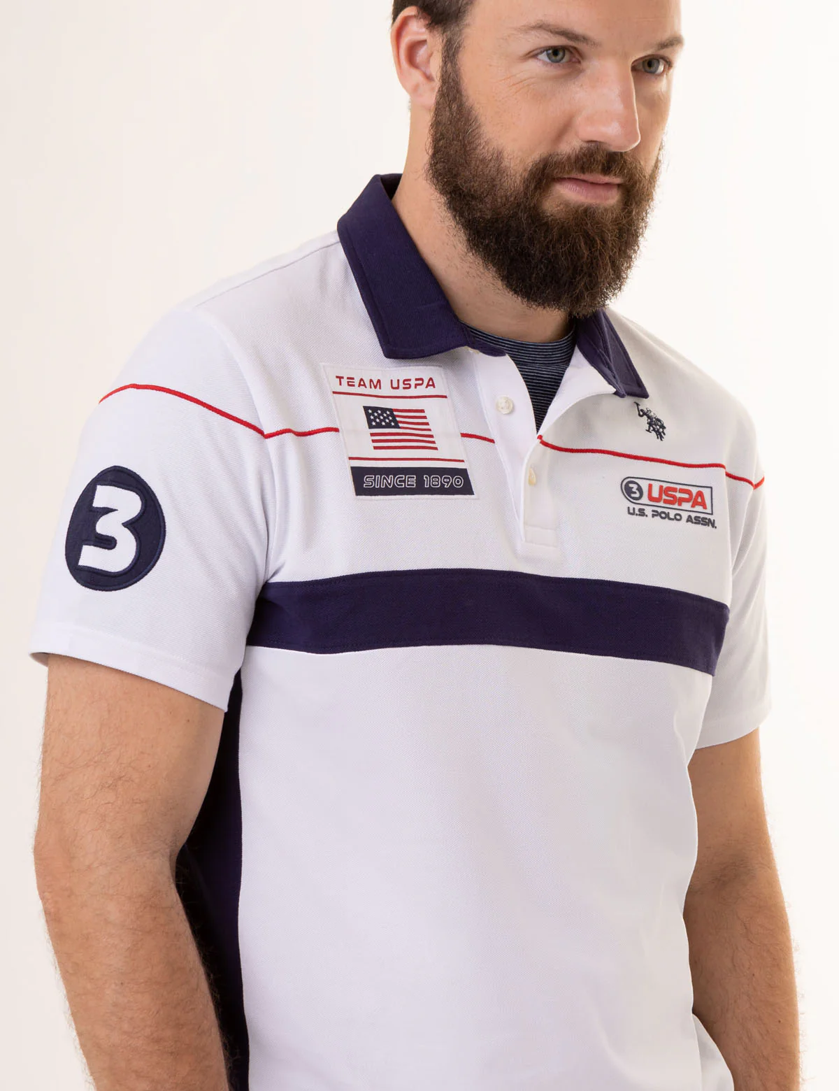 23270-team-uspa-graphic-pique-polo-shirt-2.webp TEAM USPA GRAPHIC PIQUE POLO SHIRT