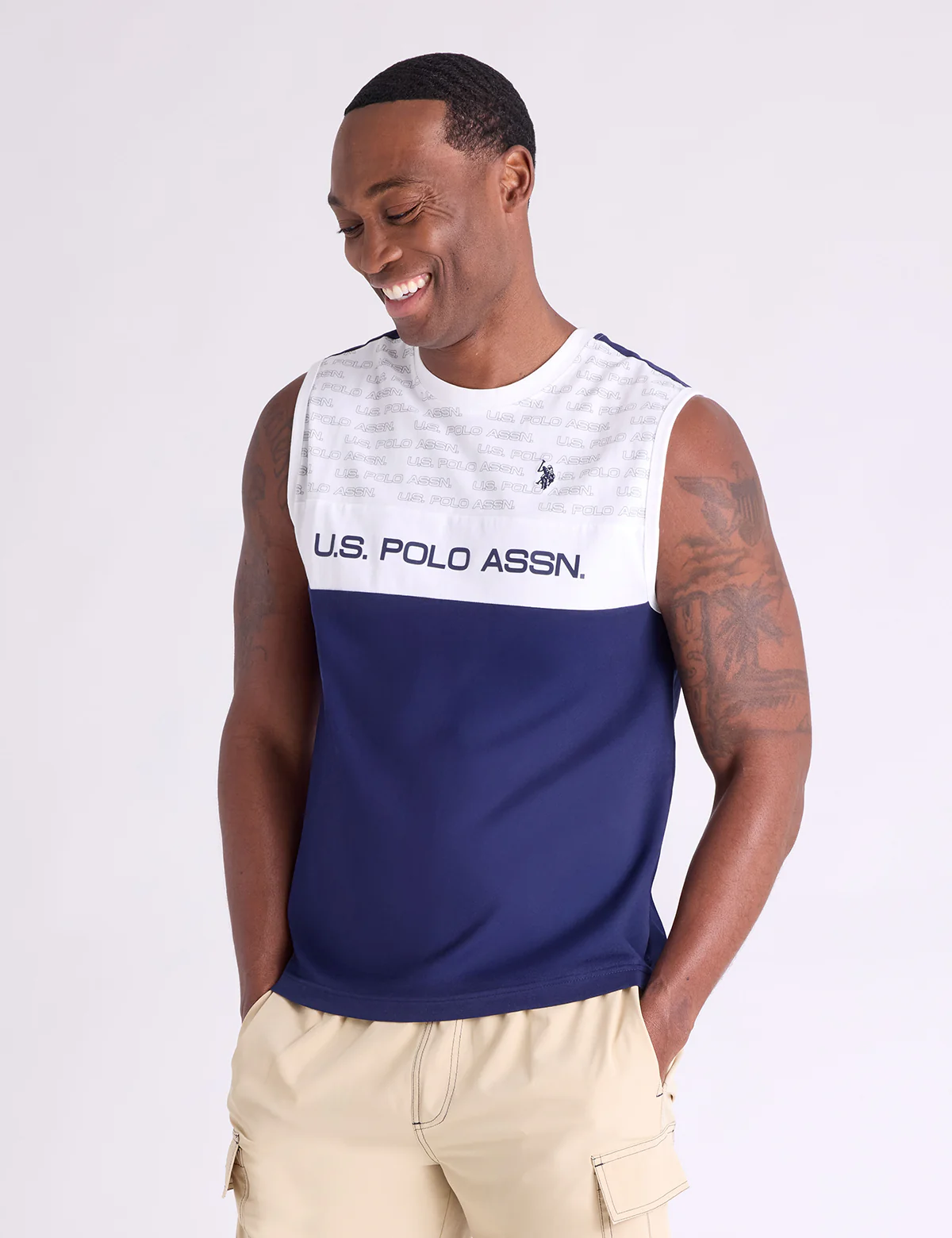390-allover-wordmark-print-colorblock-tank-1.webp ALLOVER WORDMARK PRINT COLORBLOCK TANK