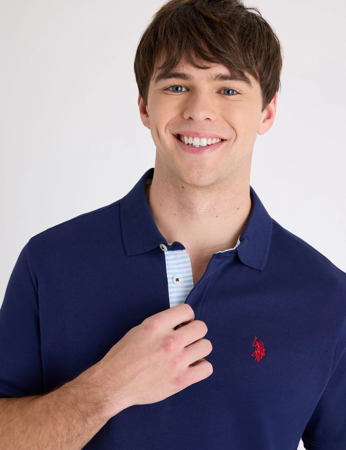 692-solid-interlock-polo-shirt-with-stripe-trim-1.webp SOLID INTERLOCK POLO SHIRT WITH STRIPE TRIM