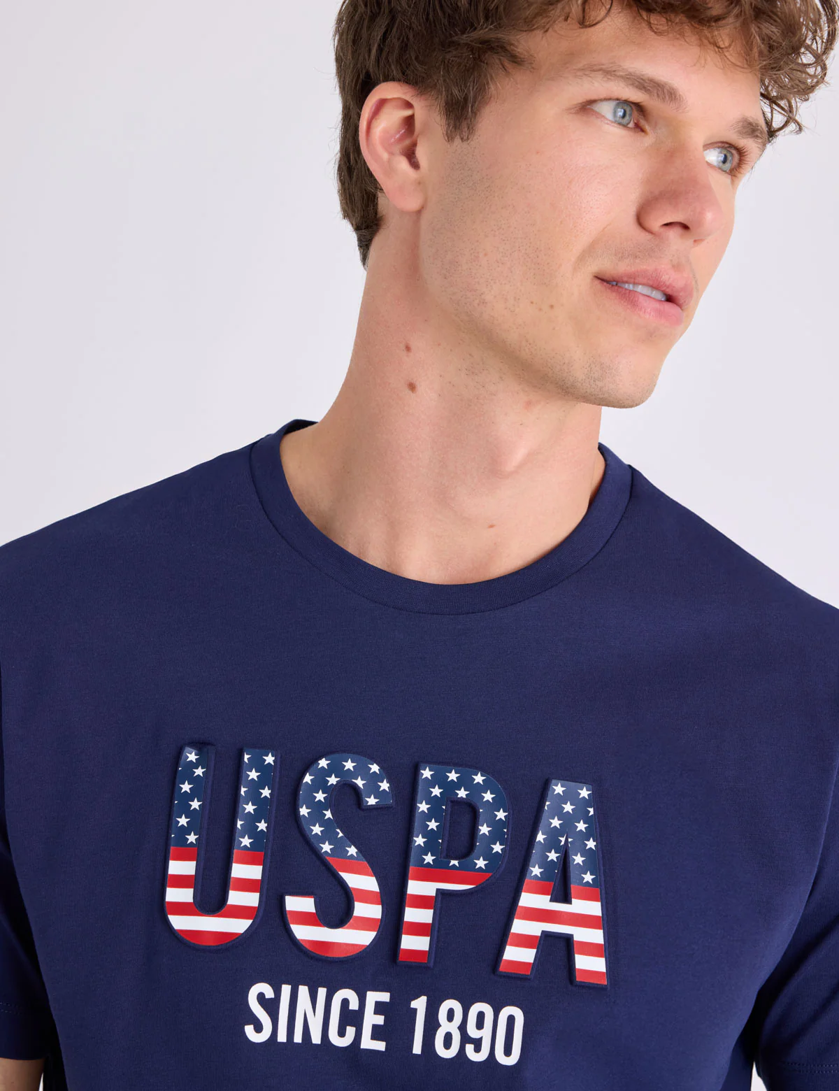 8205-uspa-embossed-wordmark-jersey-t-shirt-2.webp USPA EMBOSSED WORDMARK JERSEY T-SHIRT