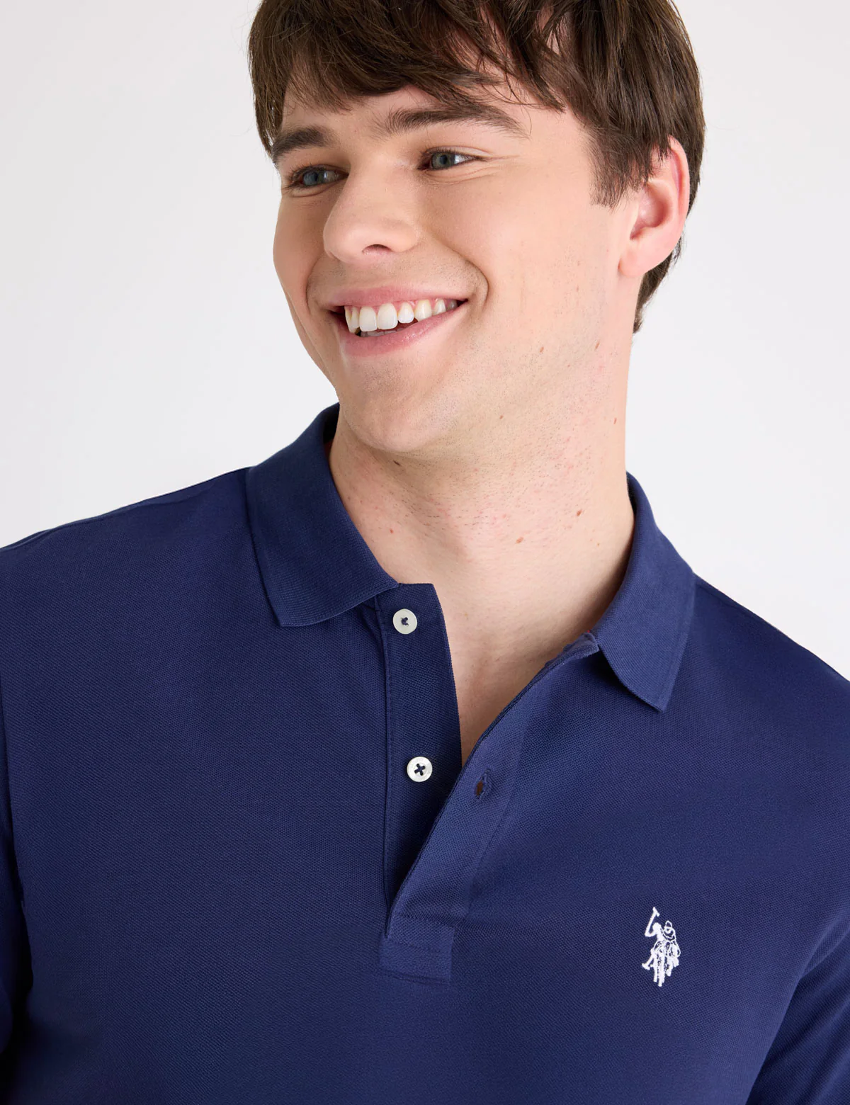 8465-slim-fit-solid-pique-polo-shirt-11.webp SLIM FIT SOLID PIQUE POLO SHIRT