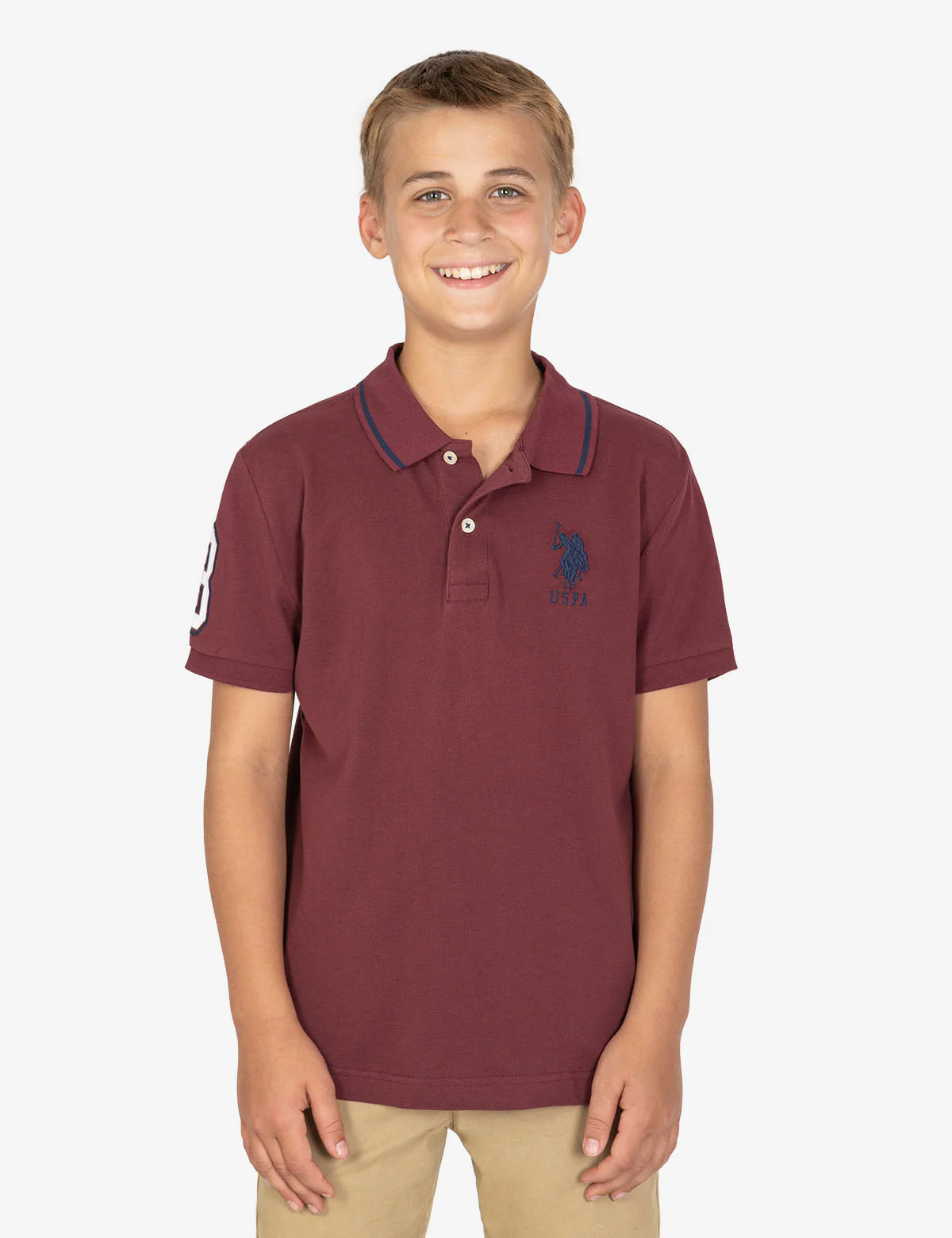 8861-boys-pique-polo-shirt-1.webp BOYS PIQUE POLO SHIRT