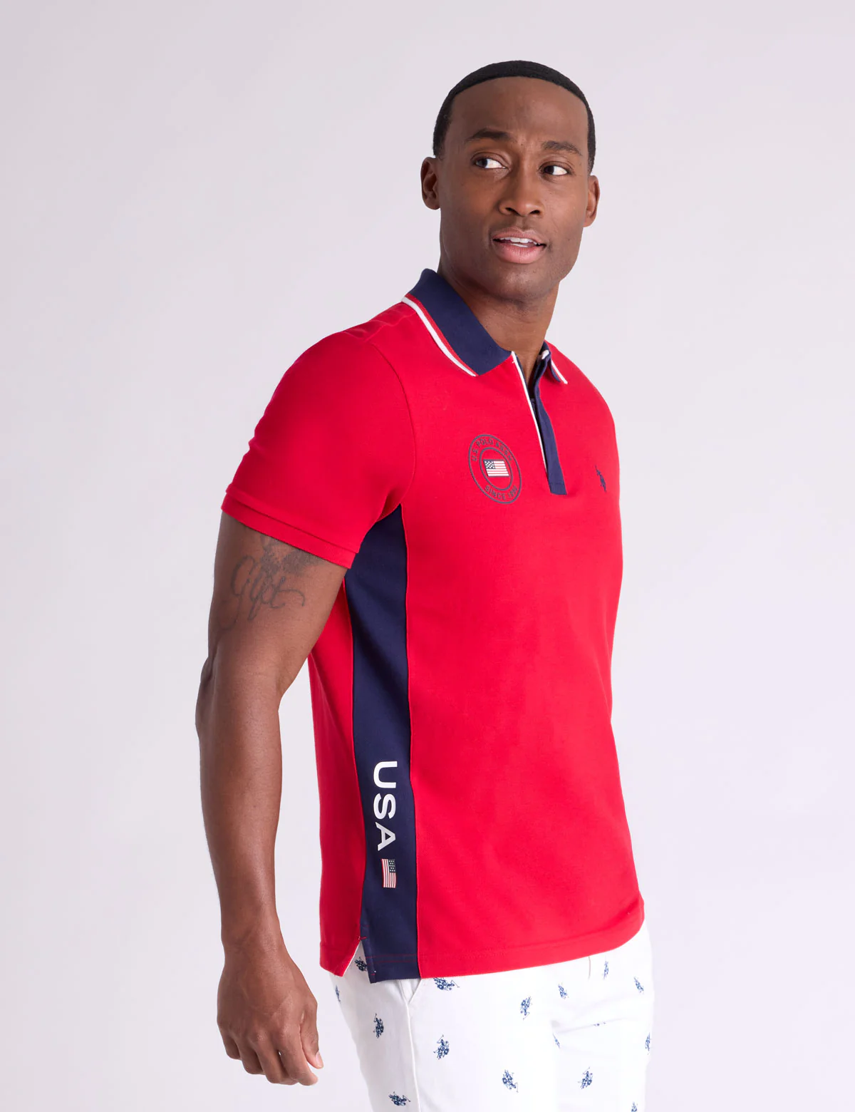890-usa-vertical-patch-pique-polo-shirt-with-zip-placket-1.webp USA VERTICAL PATCH PIQUE POLO SHIRT WITH ZIP PLACKET