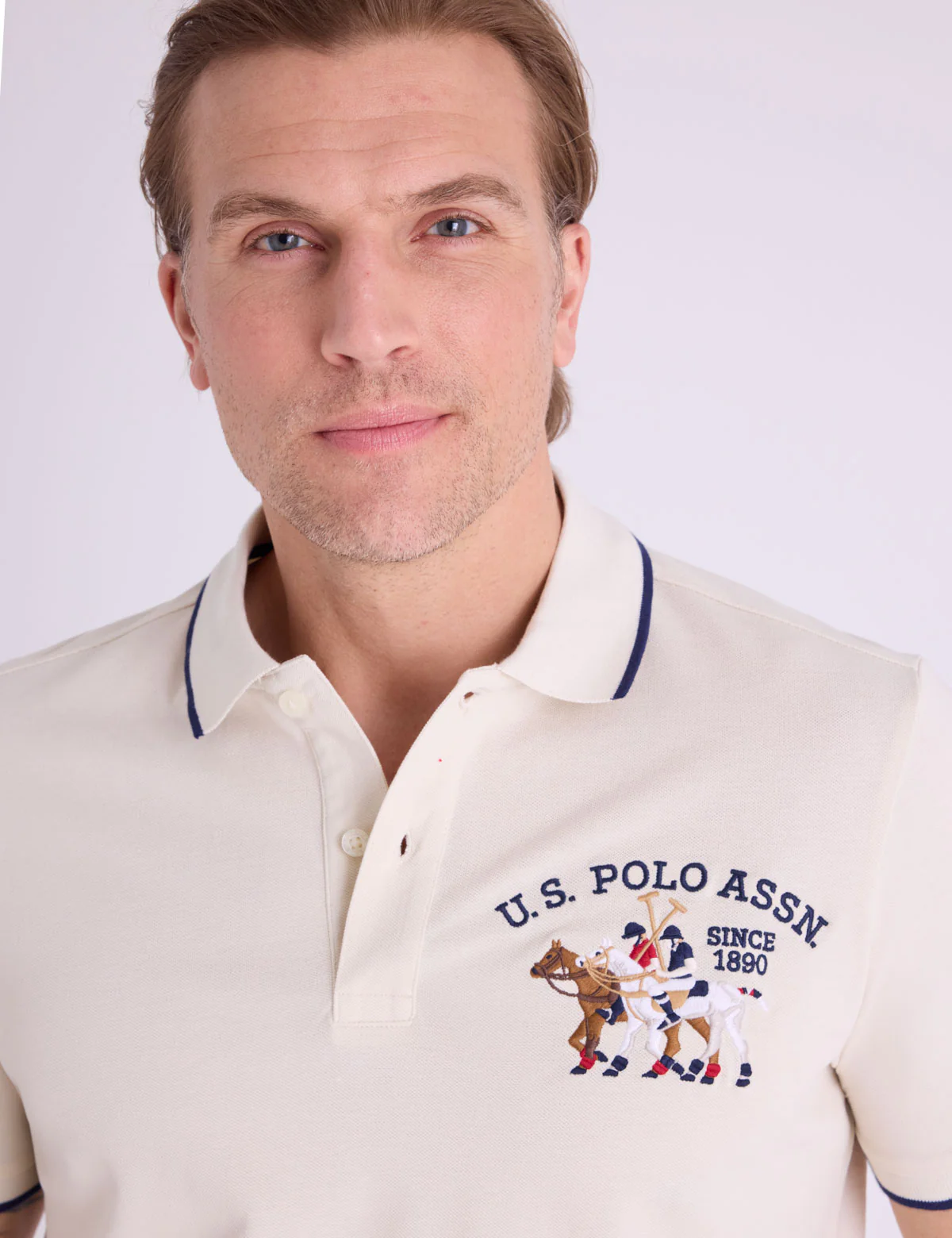 939-pique-polo-shirt-with-logo-emblem-7.webp PIQUE POLO SHIRT WITH LOGO EMBLEM