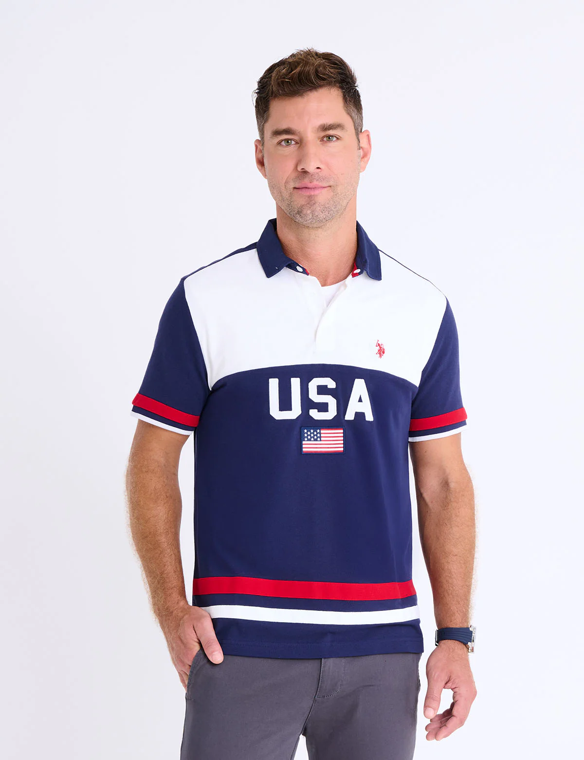 9486-color-block-usa-applique-pique-polo-shirt-1.webp COLOR BLOCK USA APPLIQUE PIQUE POLO SHIRT